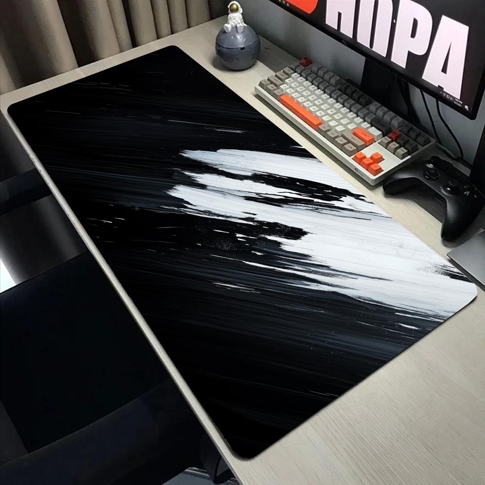 سجادة ماوس ألعاب بتصميم تجريدي - مراجعة Desk Setup Office وسعره